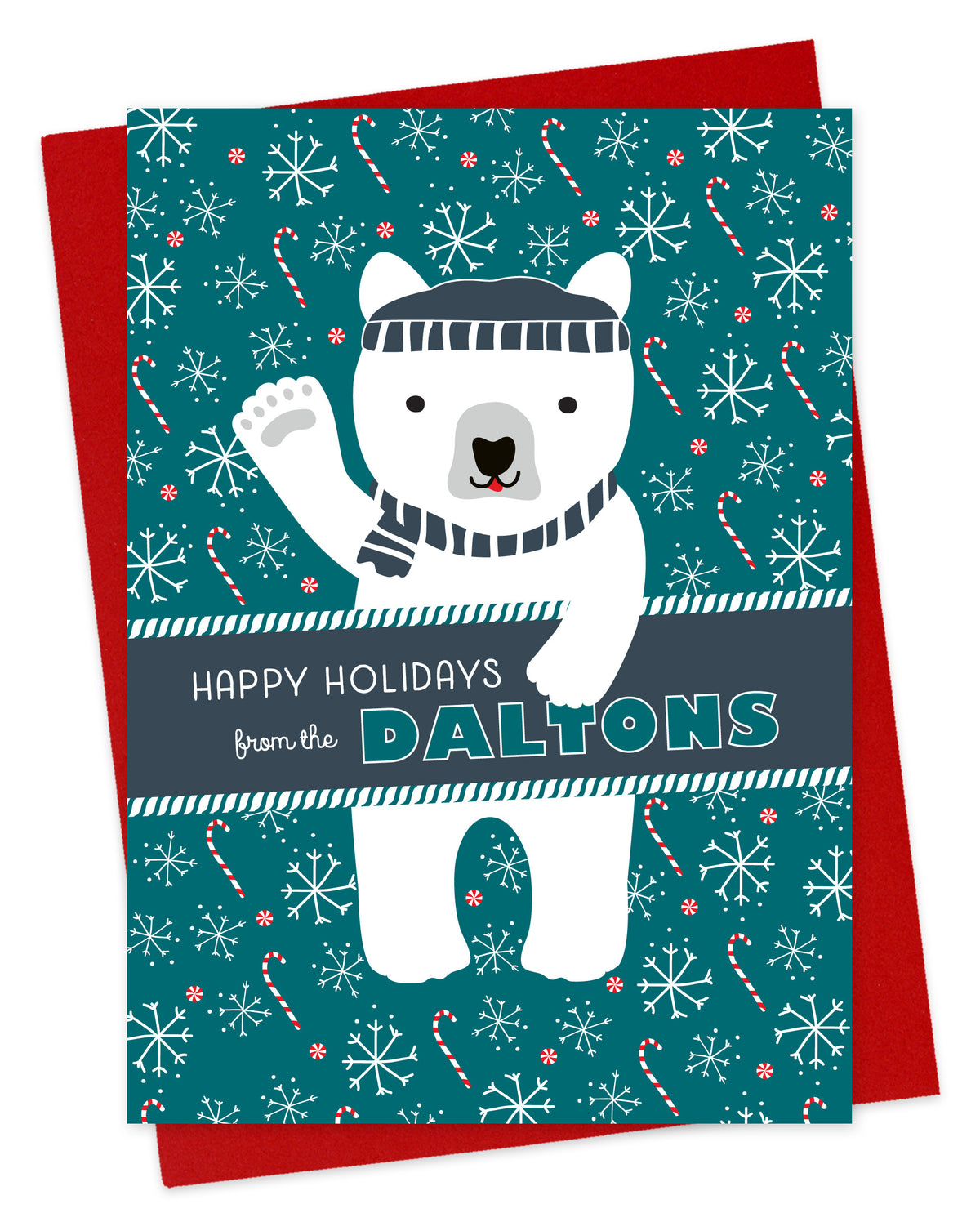 Customizable paper holiday card featuring a waving polar bear in a beanie and scarf against an aqua background with candy canes and snowflakes. A banner across the middle displays a personal greeting. Shown with a red envelope.