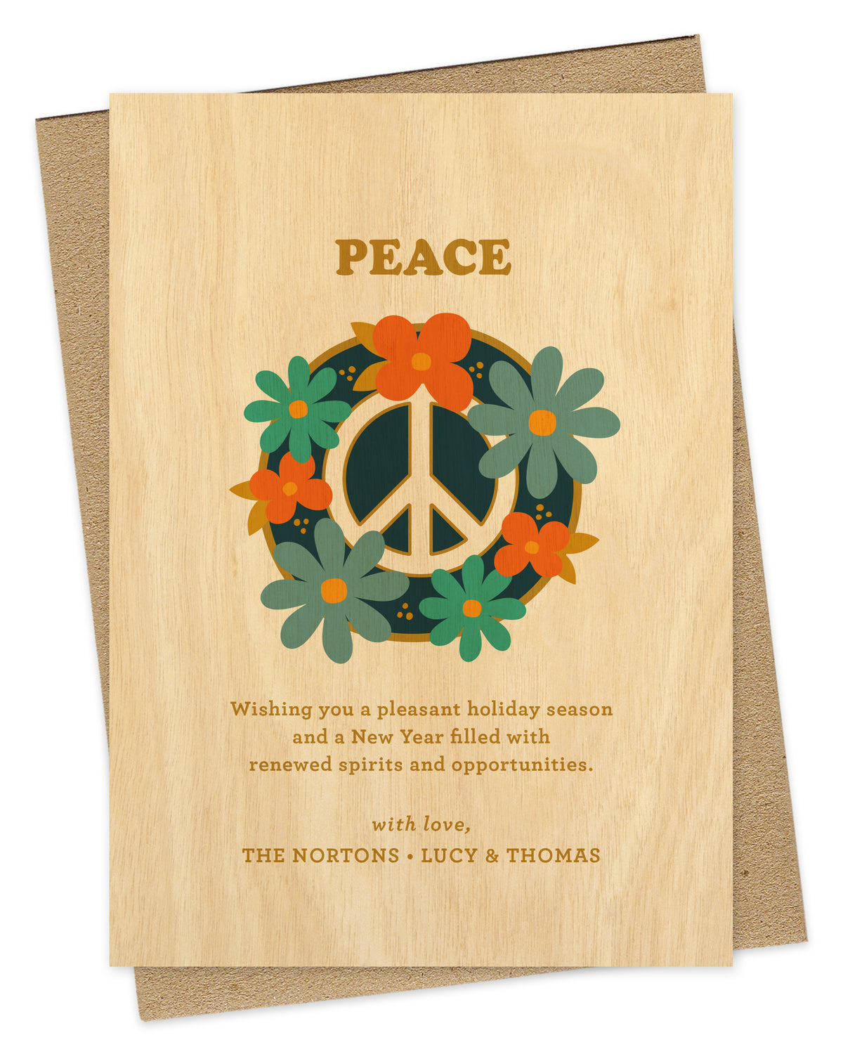 Customizable paper holiday card with a printed birch wood grain background. Card design features a peace sign surrounded by colorful flowers with “Peace” text at the top and a personal greeting at the bottom. Shown with a kraft envelope.