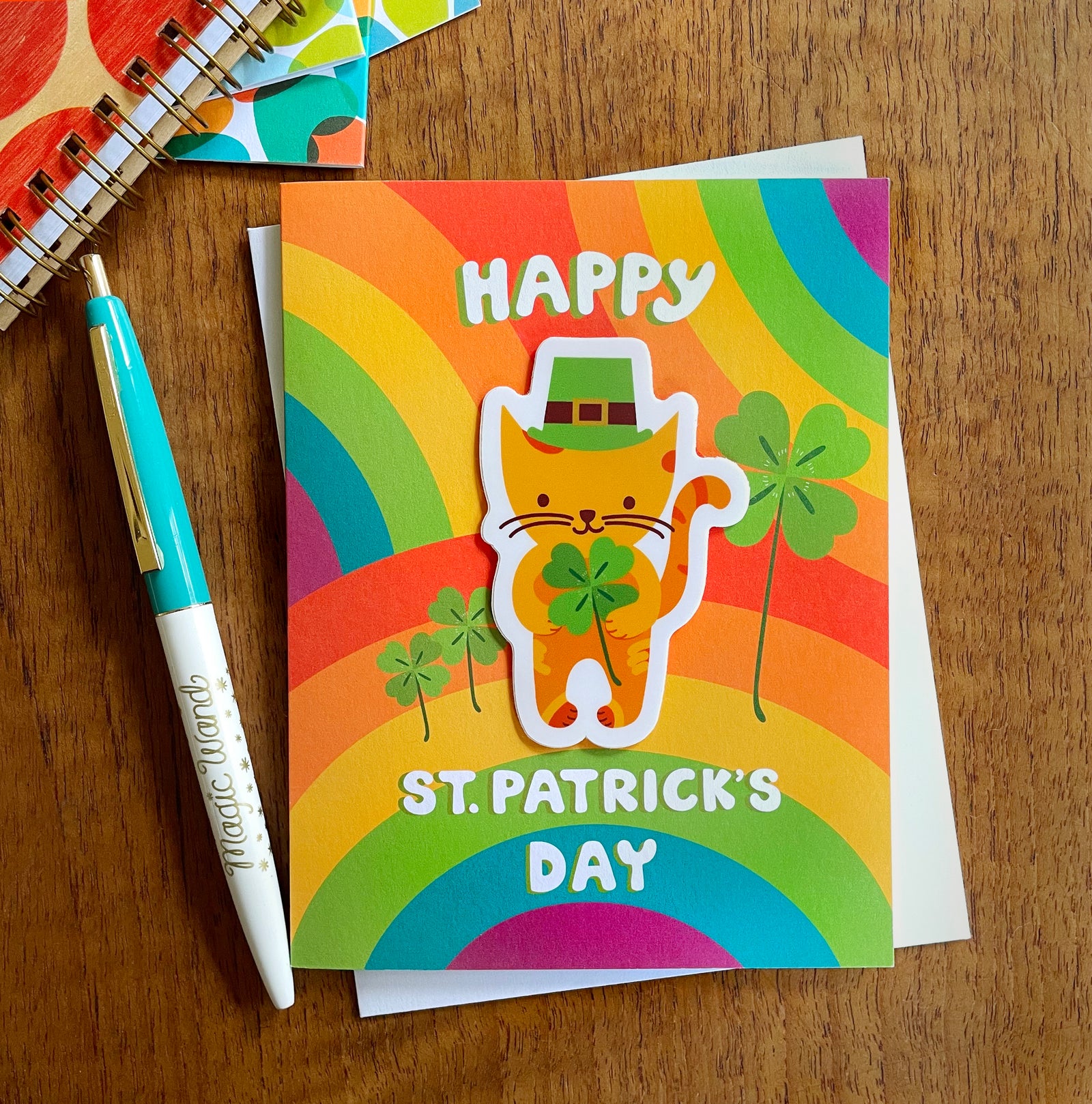 Happy St. Patrick's Day card with removable vinyl sticker featuring an orange cat holding a 4-leaf clover