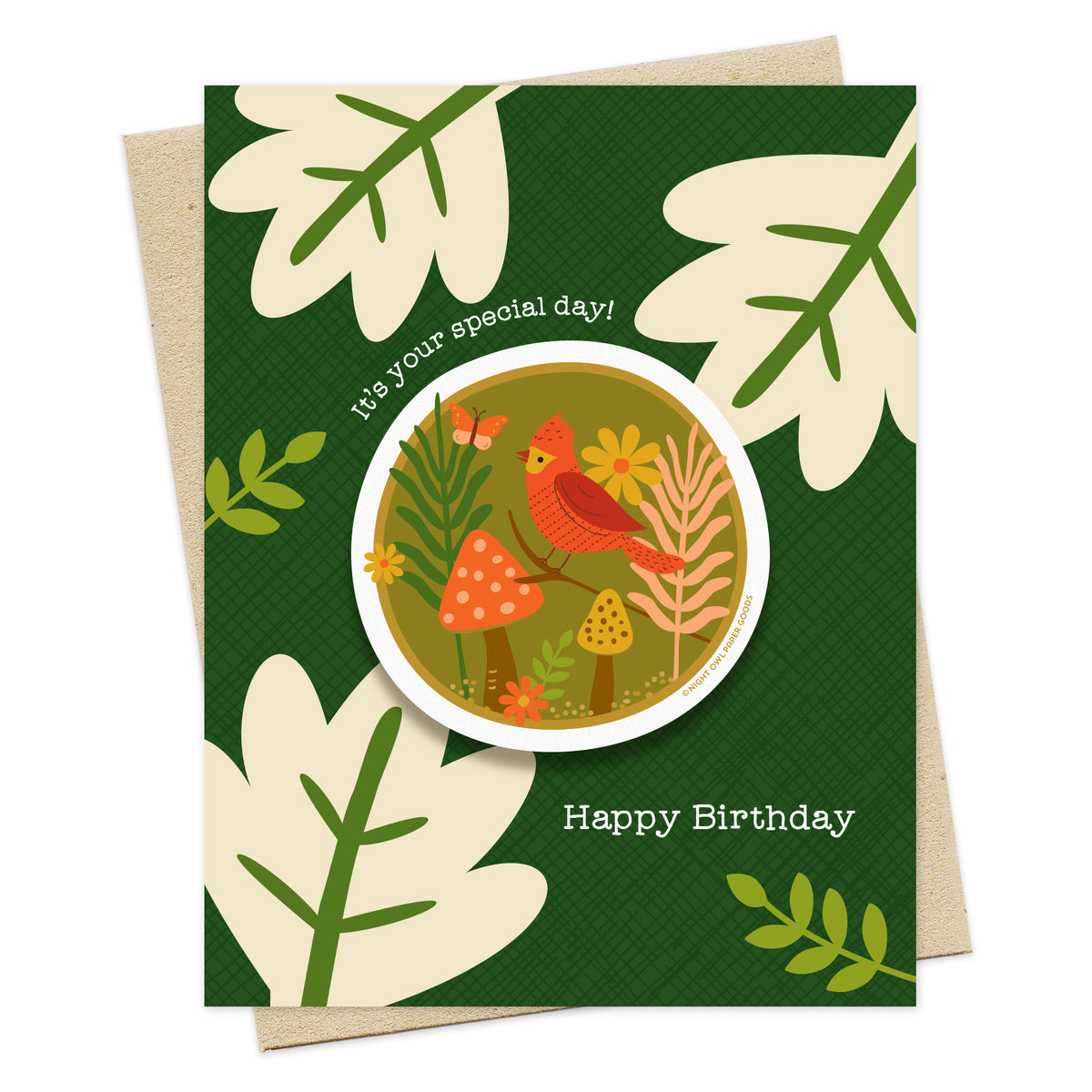 Green birthday card with round removable vinyl sticker with red bird, butterfly, forest and a few mushrooms and flowers.Card has big modern leaf background