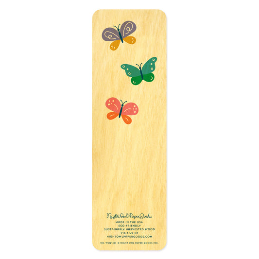 Back of birch wood bookmark with colorful butterfly designs. At the bottom: Night Owl Paper Goods script logo with text reading "Made in the USA - Eco-Friendly Sustainably Harvested Wood - Visit us at nightowlpapergoods.mom."