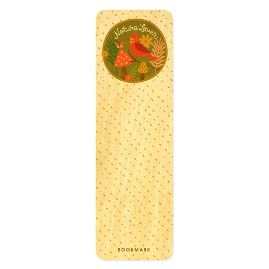 Wooden bookmark with red bird, flowers, butterfly and mushrooms in a circle that reads 'Nature Lover' in script handwriting. Text at bottom reads "bookmark."