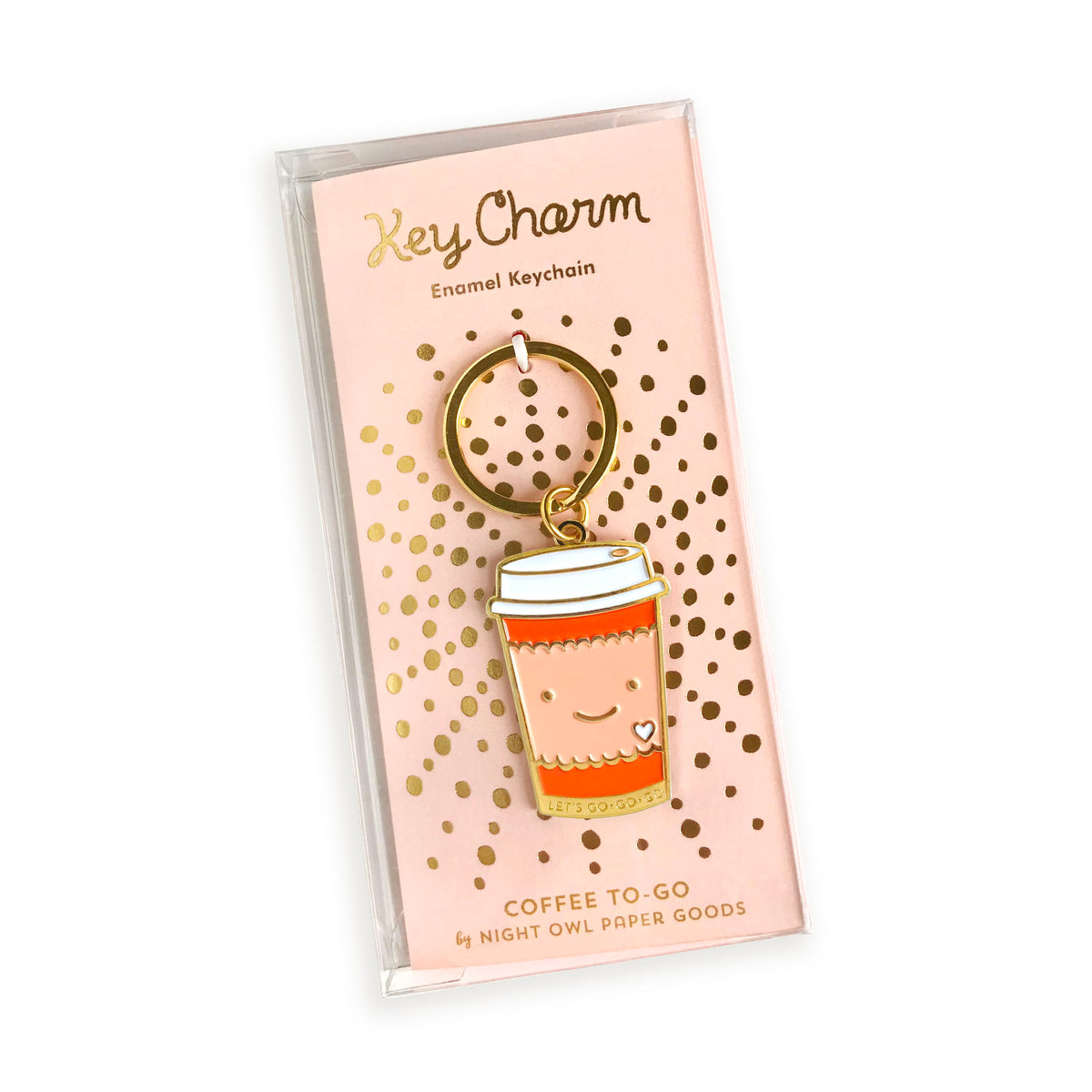 Coffee to go enamel keychain on pink gold foil stamped backer card packaged in a clear gift box. Backer card reads "Key Charm Enamel Keychain" at top and "Coffee To-Go by Night Owl Paper Goods" at bottom.