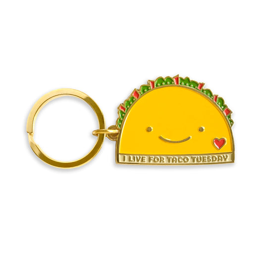 Gold metal taco enamel keychain with yellow smiling taco design, small red heart and "I live for Taco Tuesday" message on a gold key ring