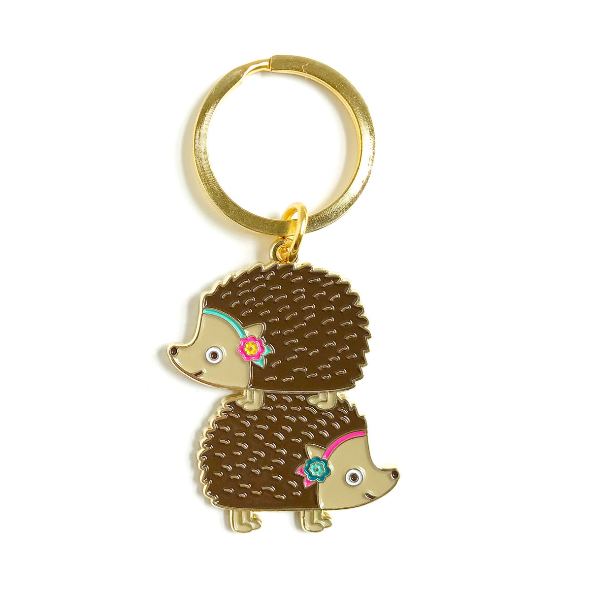 Gold metal stacked hedgehogs enamel keychain featuring two hedgehogs stacked on top of each other on a gold key ring
