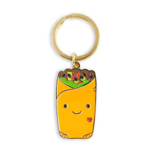 Gold metal burrito enamel keychain featuring a smiling yellow burrito with colorful fillings and a small red heart on a gold key ring.