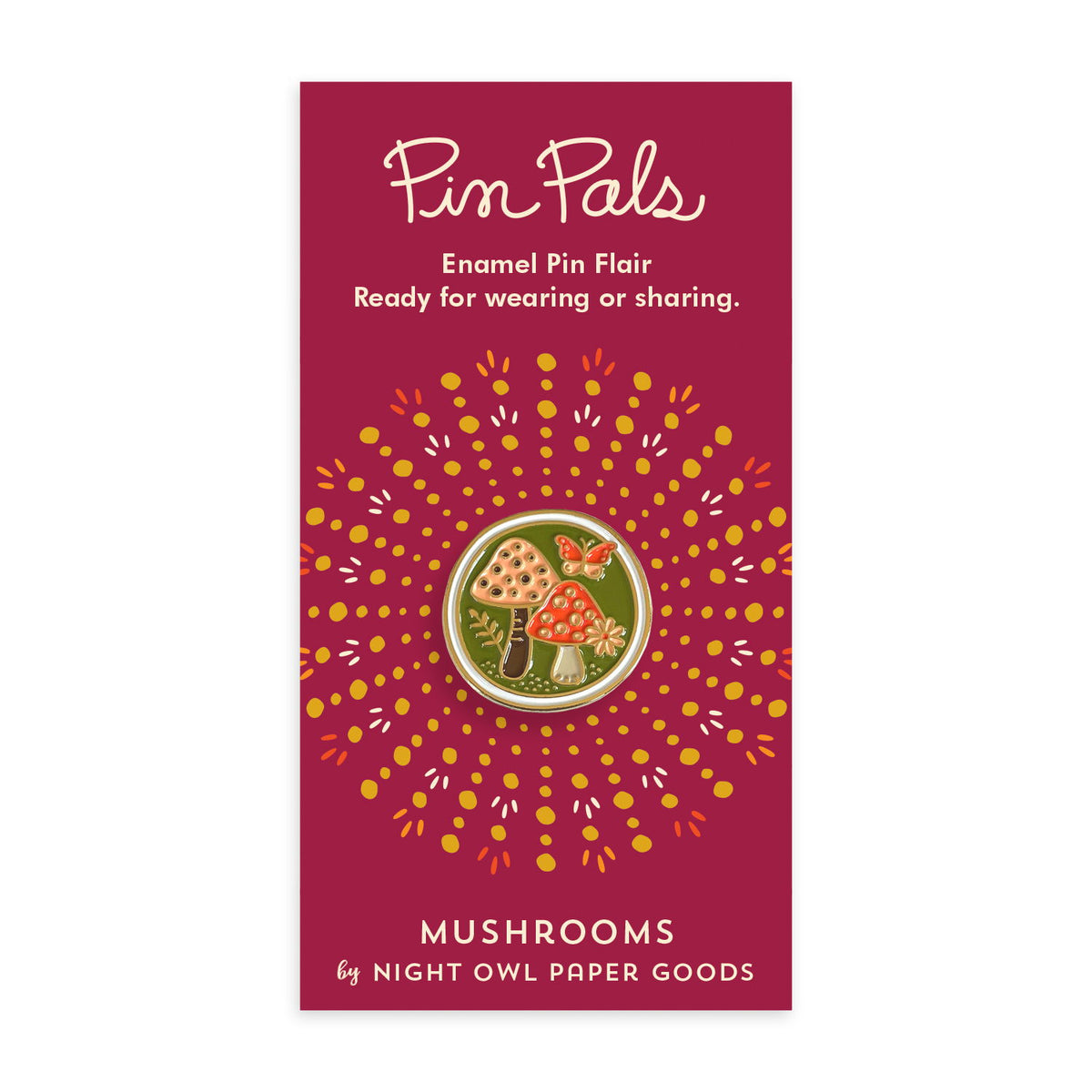 Round enamel pin with mushrooms and a butterfly on a green background, bordered with gold. Pin is on a maroon backer card that reads "Pin Pals - Enamel Pin Flair - Ready for wearing or sharing" at top and "MUSHROOMS by Night Owl Paper Goods" at bottom.