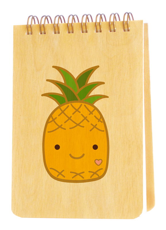 Spiral-bound wood mini notepad with birch wood covers featuring a smiling kawaii-style pineapple character with a tiny pink heart and green leafy top.