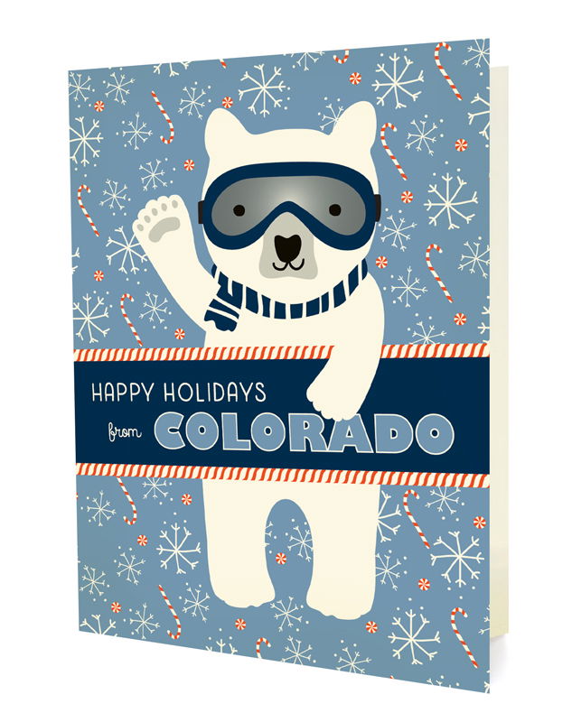 Polar Colorado folded paper holiday card featuring a polar bear in ski goggles and a navy striped scarf waving against a light blue background with snowflakes and candy canes and the greeting "Happy Holidays from Colorado"