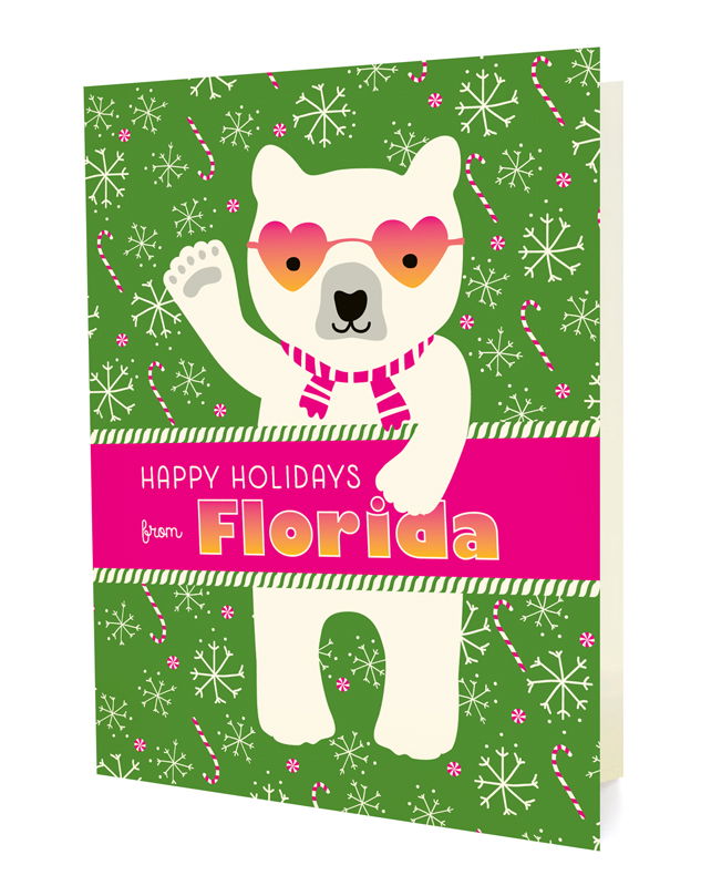 Polar Florida folded paper holiday card featuring a polar bear in heart-shaped sunglasses and a striped scarf waving against a green background with snowflakes and candy canes and the greeting "Happy Holidays from Florida"