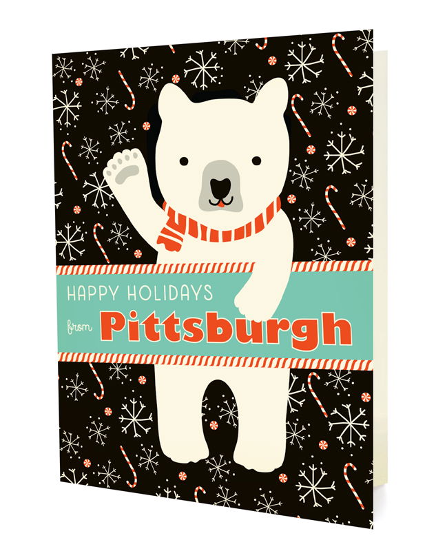 Polar Pittsburgh folded paper holiday card featuring a polar bear in a red striped scarf waving against a dark background with snowflakes and candy canes and the greeting "Happy Holidays from Pittsburgh"