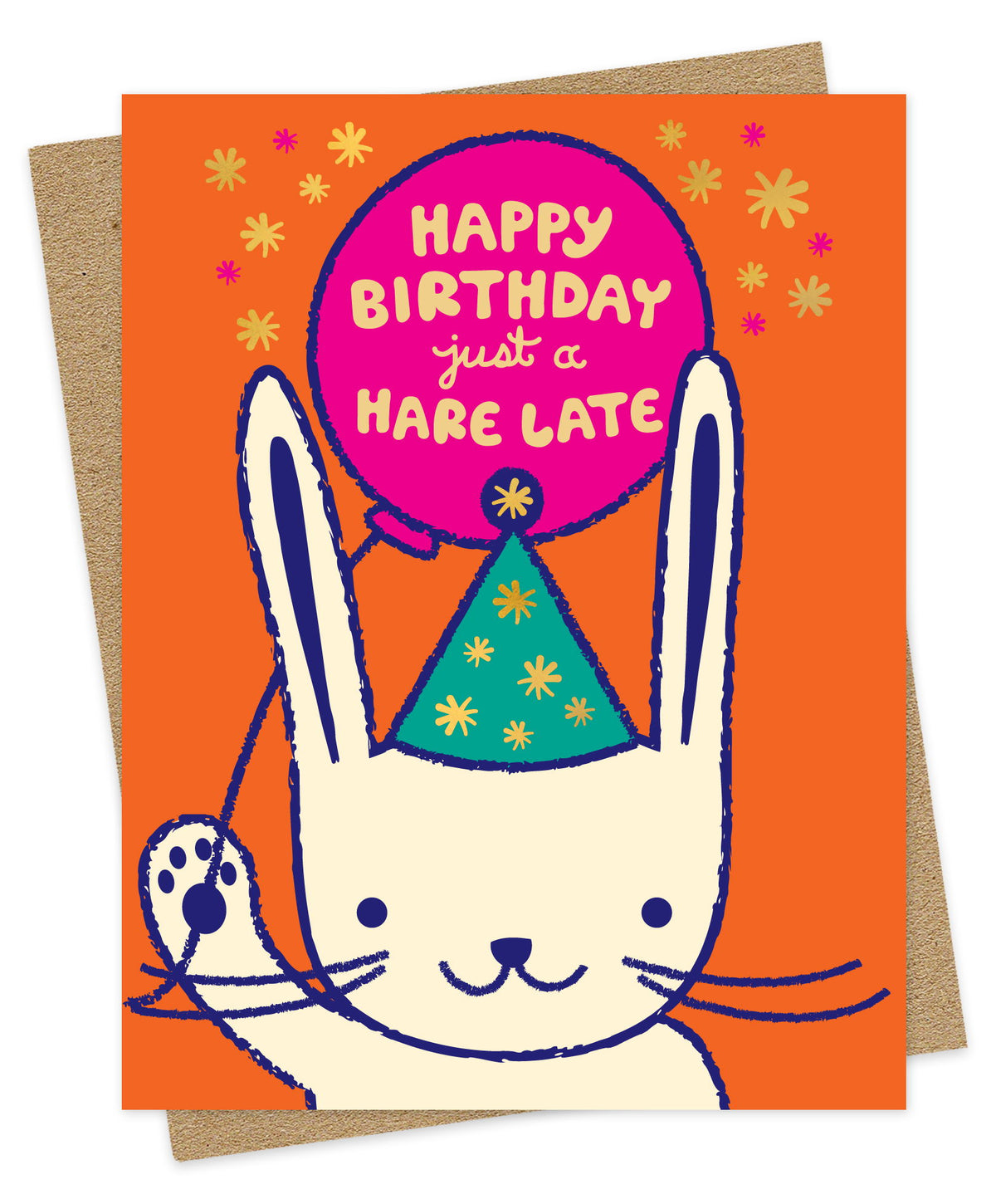 Belated birthday greeting card featuring a white bunny rabbit illustration, “Happy Birthday Just a Hare Late” message and  gold foil accents on an orange background. Shown with a kraft envelope.