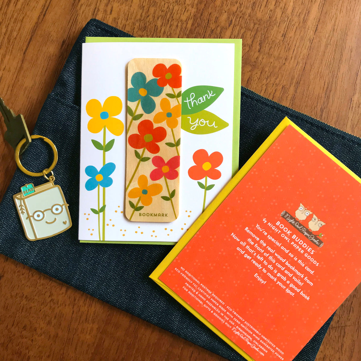 Thank You Flowers Bookmark card alongside gold metal Book Lover enamel keychain 