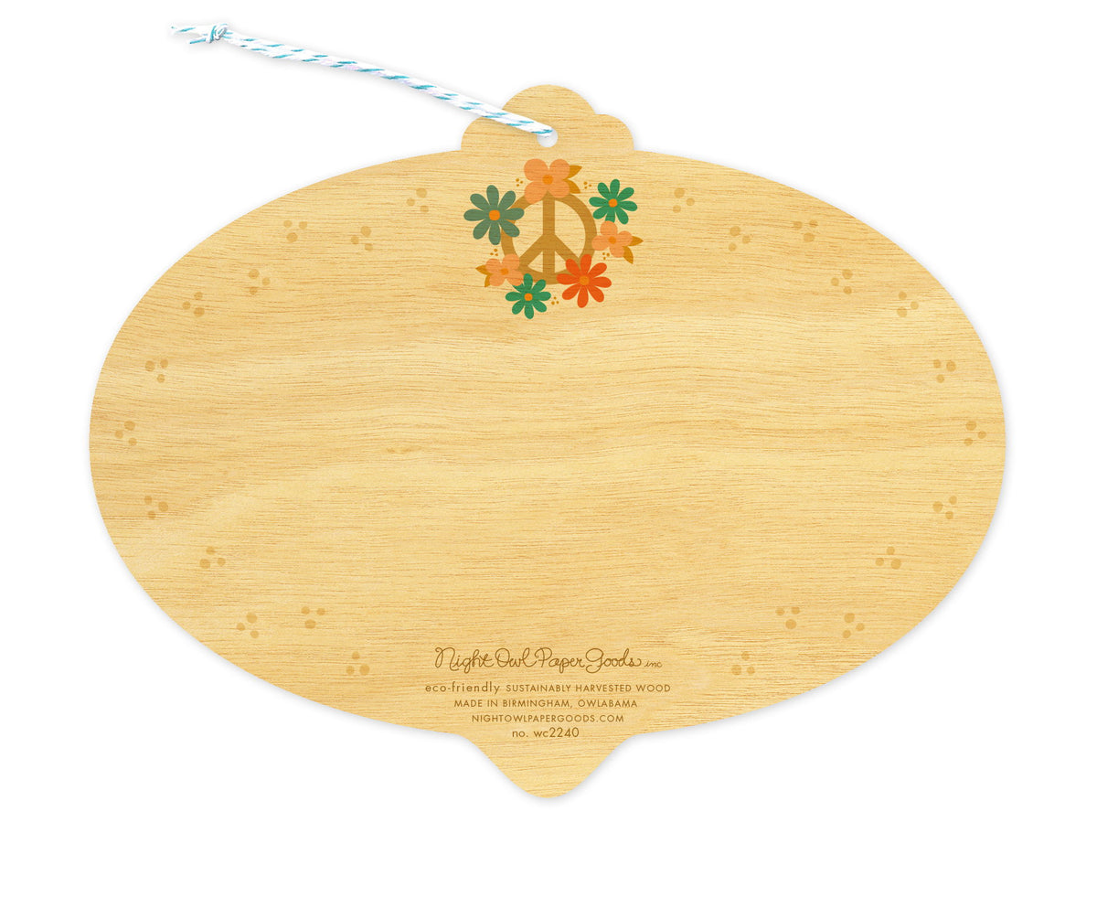 Back of Peace Bulb wood ornament holiday card, which is die-cut in the shape of a bulb and features a floral peace sign at the top, faint dot designs along the edges and space to write a personal greeting. Along the bottom is the company logo and text that reads "eco-friendly sustainably harvested wood - made in  birmingham, owlabama - nightowlpapergoods.mom