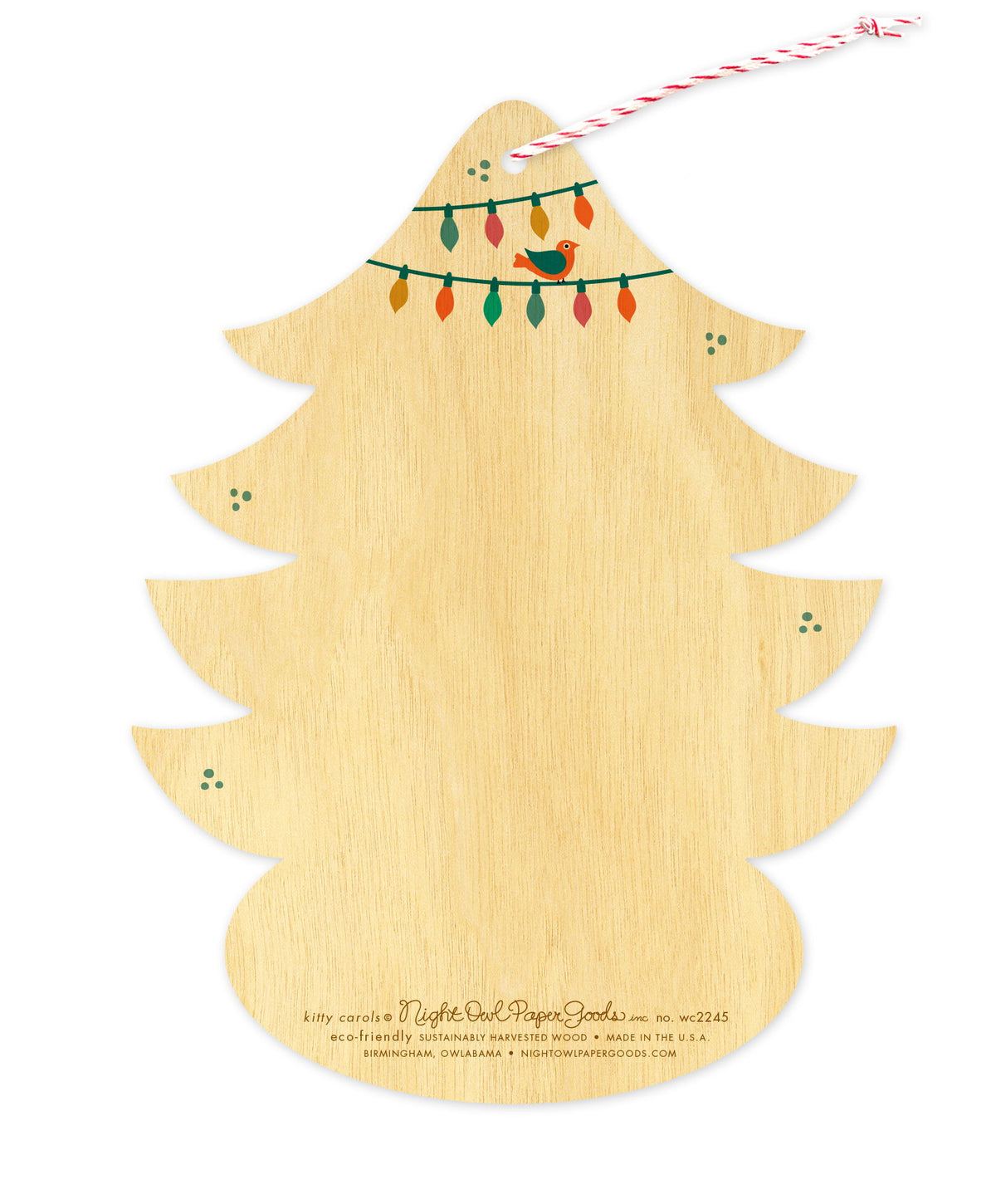 Back of Kitty Carols wood holiday ornament card, which is die-cut in the shape of a tree and features a small bird and Christmas lights design elements on top and space to write a personal greeting. Along the bottom is the company logo and text that reads "eco-friendly sustainably harvested wood - made in  birmingham, owlabama - nightowlpapergoods.mom"