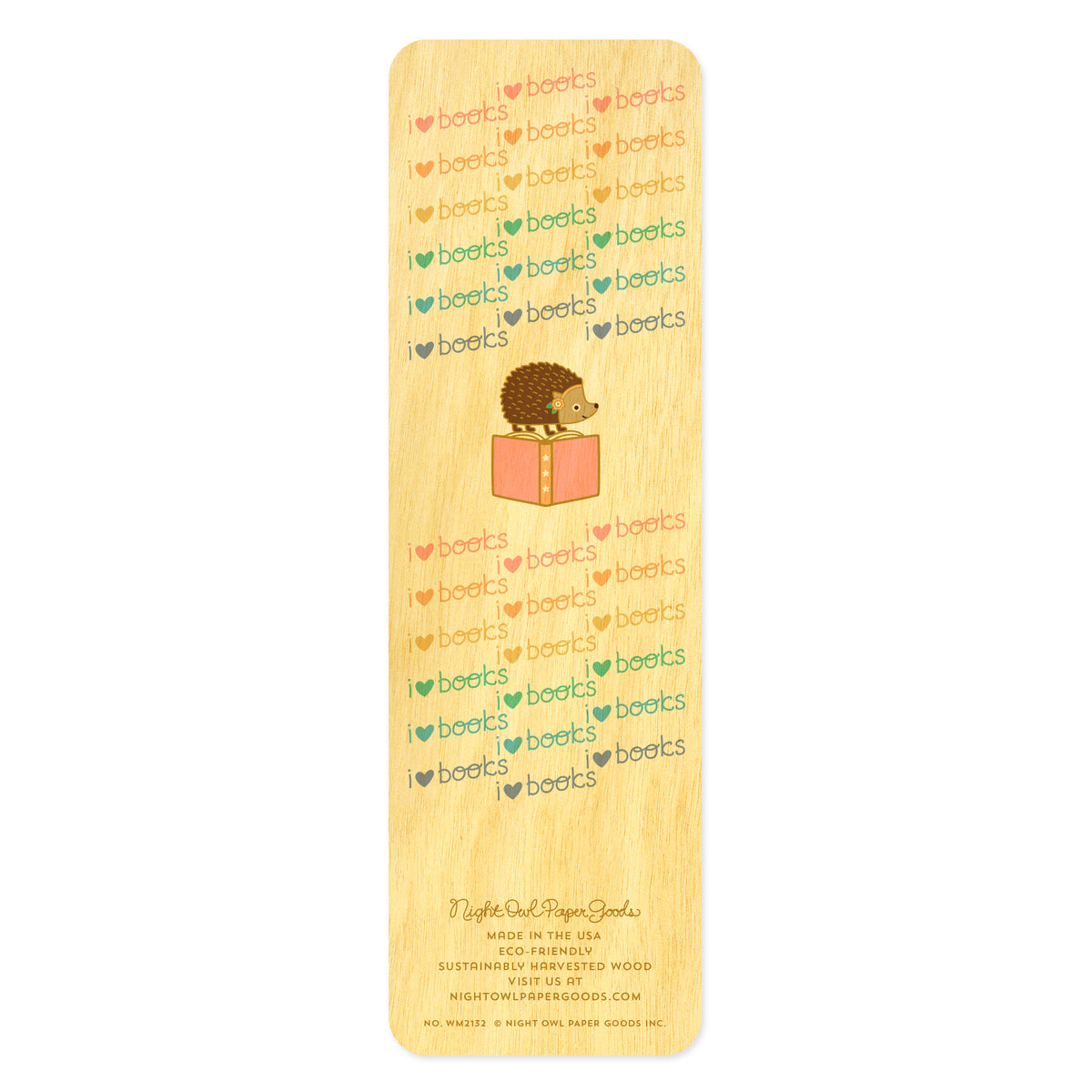 Back of birch wood bookmark with a hedgehog standing on top of a pink book surrounded by a pastel "I heart books" text pattern. At the bottom: Night Owl Paper Goods script logo with text reading "Made in the USA - Eco-Friendly Sustainably Harvested Wood - Visit us at nightowlpapergoods.mom."