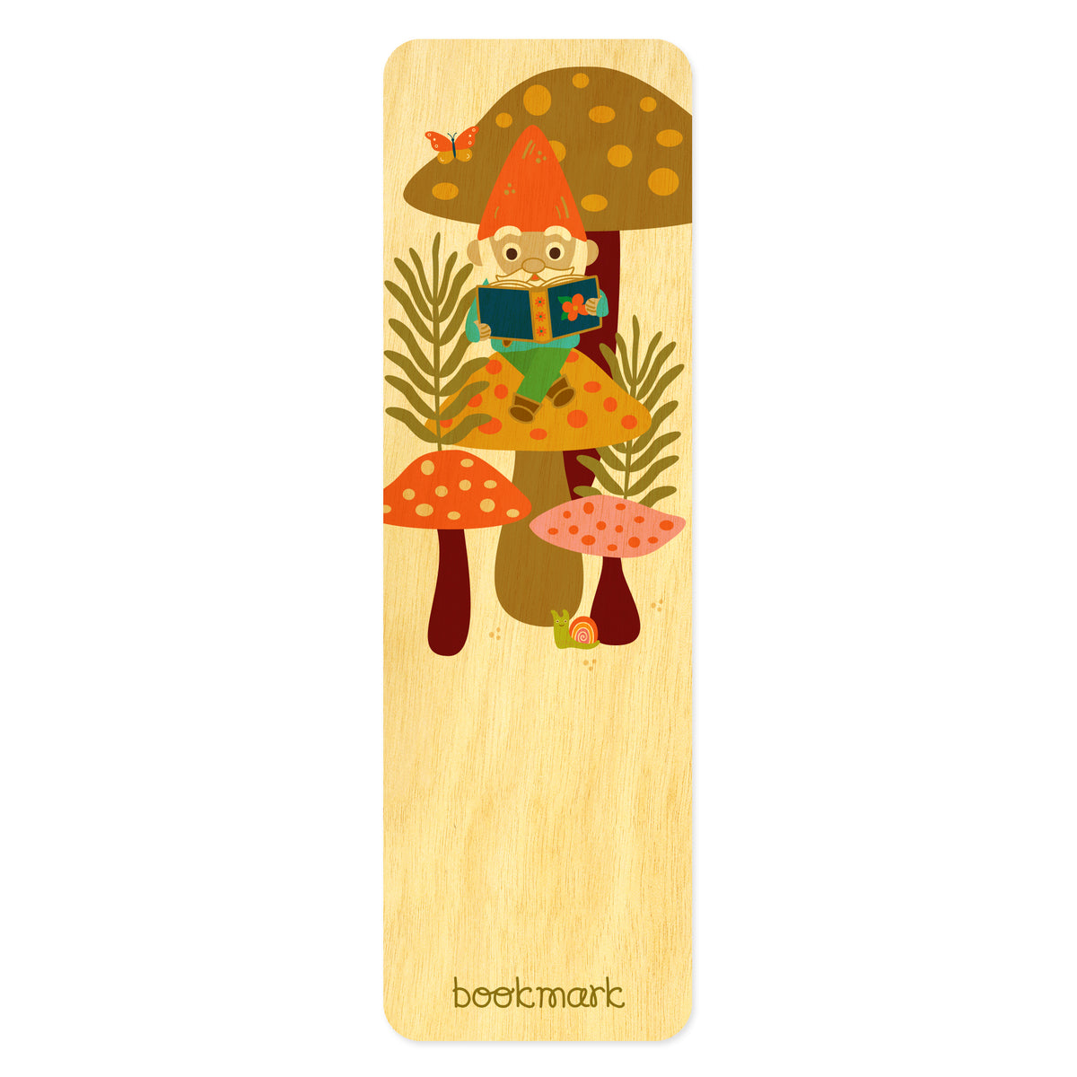 Wooden bookmark with an illustration of a gnome sitting on a mushroom reading. Text at bottom reads "bookmark." 